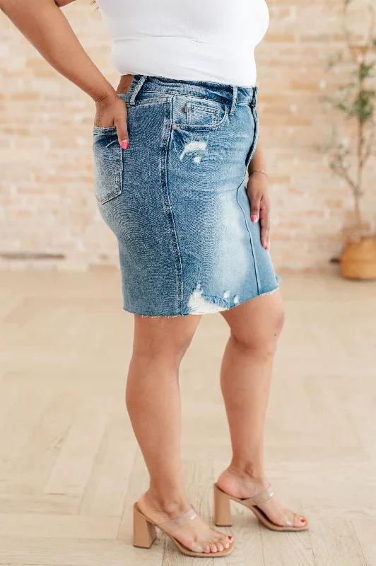 carol-high-rise-rigid-magic-denim-skirt