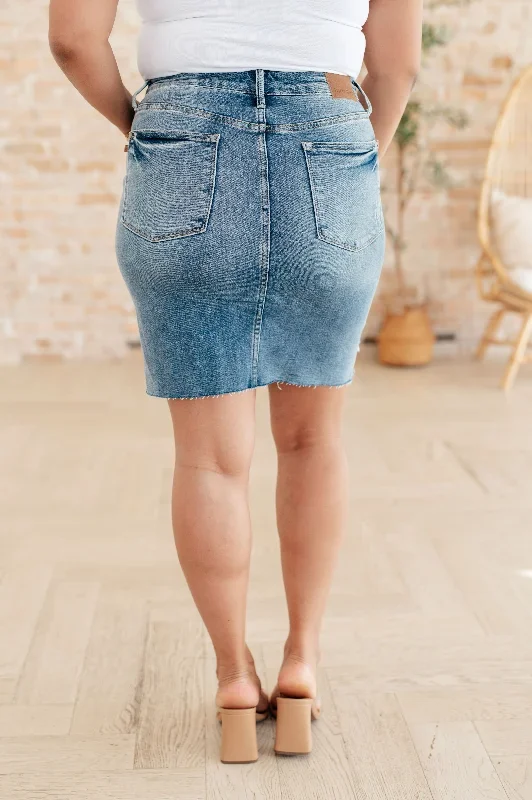 carol-high-rise-rigid-magic-denim-skirt